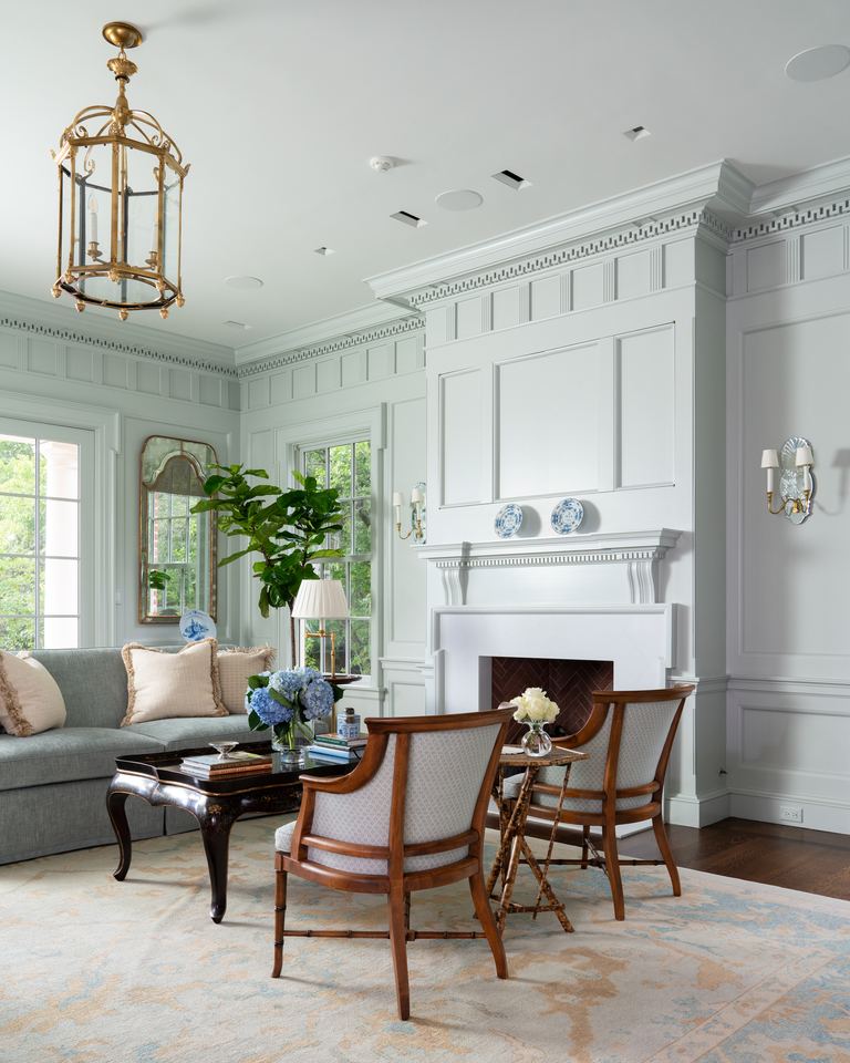 Panelled living room with fireplace