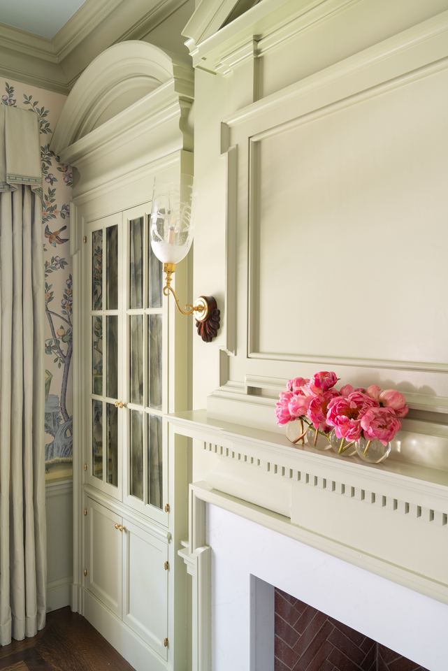 Fireplace and glass cabinet detail