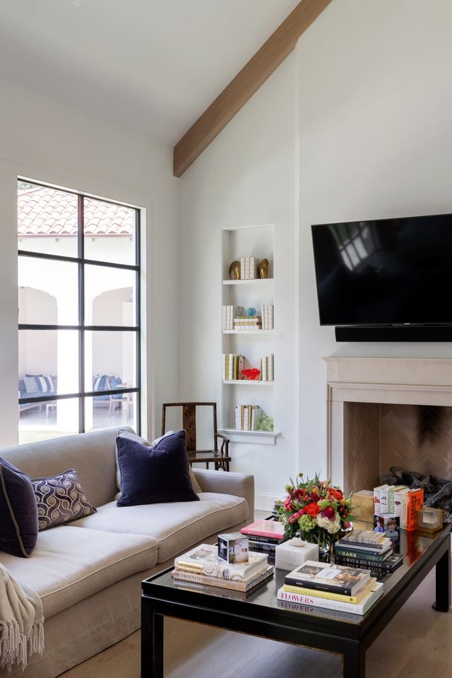 Living room seating beside the fireplace