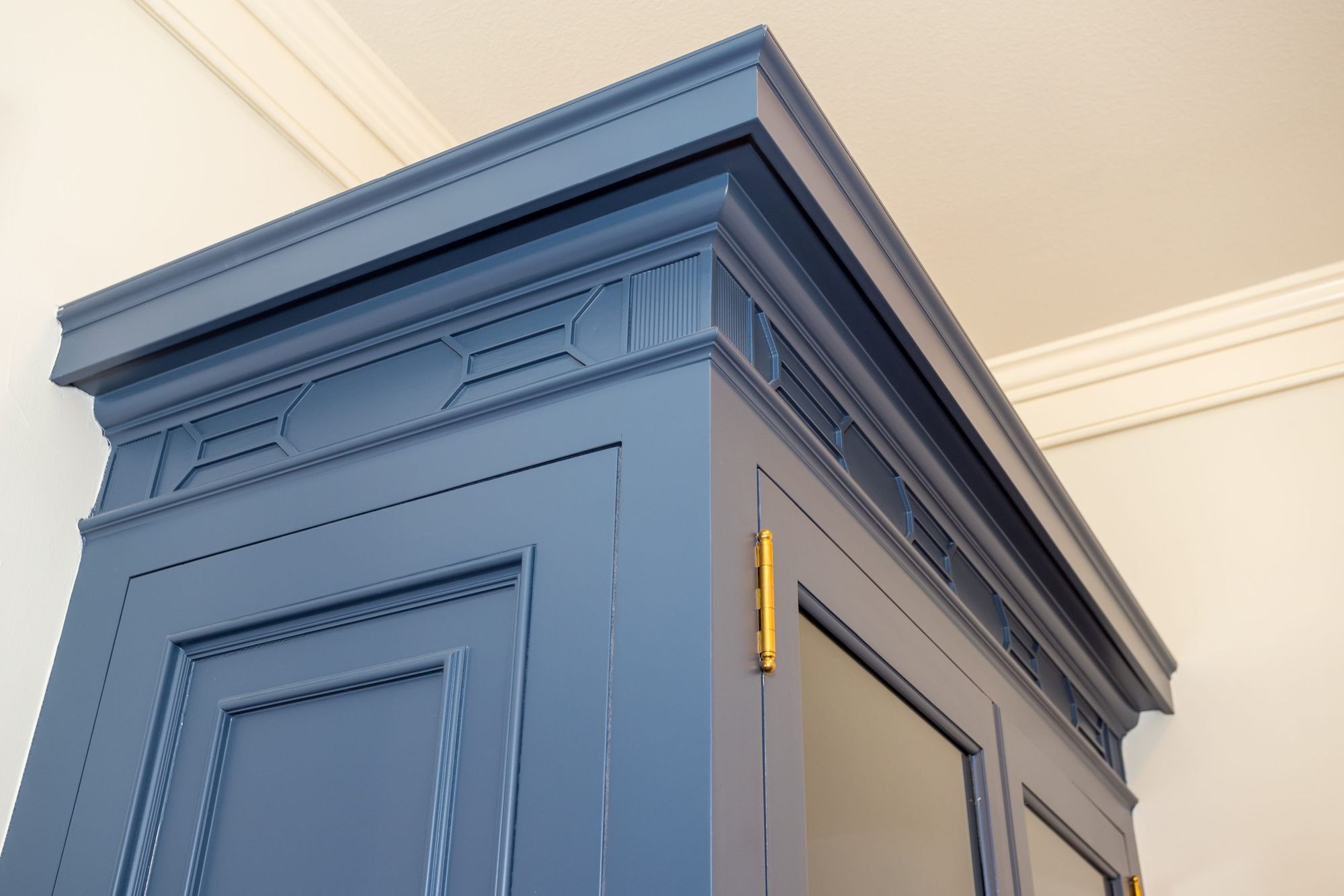 Detail of a painted cabinet cornice