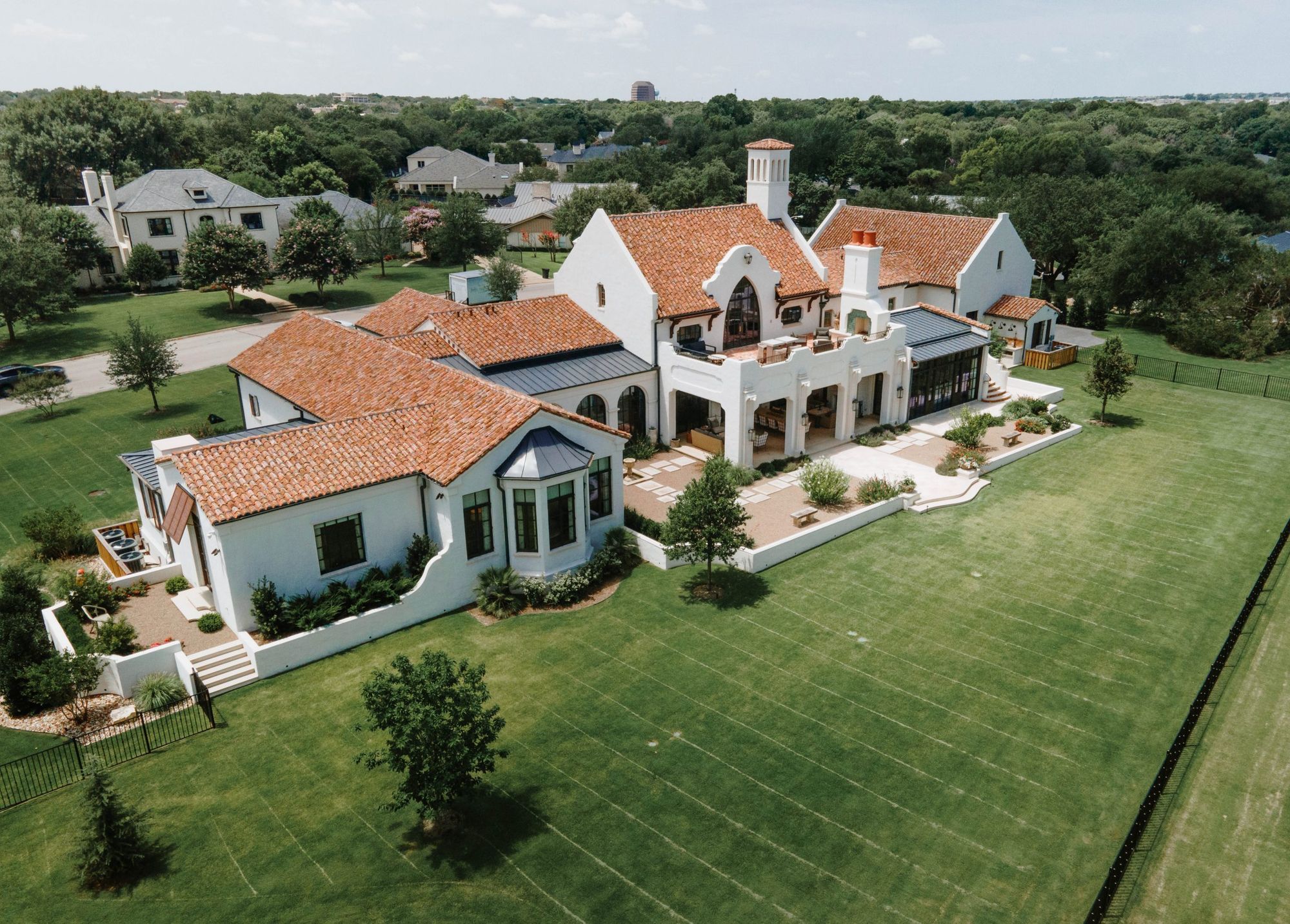 Aerial view of the house and lawn from the garden side