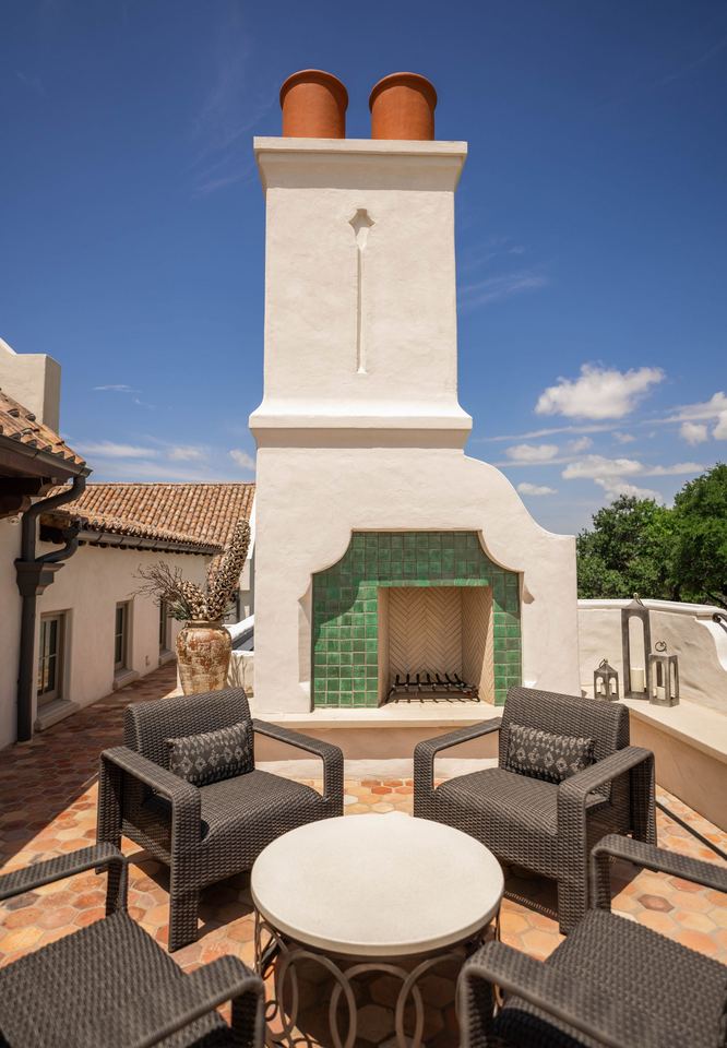 Roof terrace beside a tiled chimney